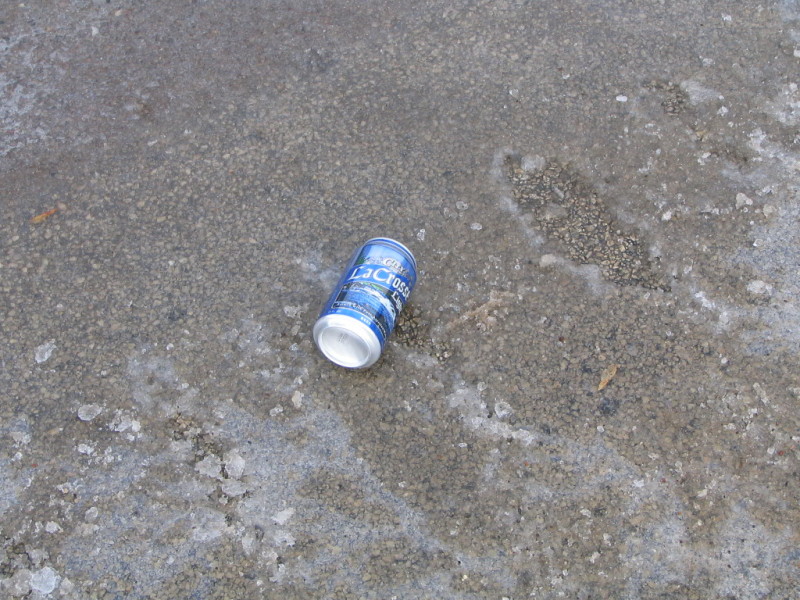 beer can in road